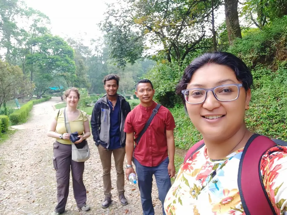 SS Seeds team members walking together on a nature trail during a field trip
